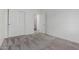 Neutral bedroom featuring carpet floors, white walls and doors at 3019 E Redfield Rd, Phoenix, AZ 85032
