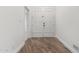Home entryway features wood-look flooring and a double door closet at 3019 E Redfield Rd, Phoenix, AZ 85032