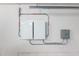 Garage featuring clean, white Tesla Powerwall setup at 3019 E Redfield Rd, Phoenix, AZ 85032