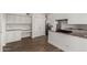 Bright kitchen features white cabinets, granite countertops, and stainless steel appliances at 3019 E Redfield Rd, Phoenix, AZ 85032