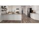 Bright kitchen with white cabinets, granite countertops, and stainless steel appliances at 3019 E Redfield Rd, Phoenix, AZ 85032