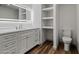 Beautifully renovated bathroom with vanity, lighted mirror, and built in shelving at 3104 E Broadway Rd -- # 287, Mesa, AZ 85204