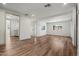 Bright living room featuring wood-look flooring, neutral walls, and natural light at 3104 E Broadway Rd -- # 287, Mesa, AZ 85204