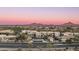 Panoramic aerial view of the residential community, highlighting the community layout, desert landscape, and distant mountains at 34457 N Legend Trail Pkwy # 1003, Scottsdale, AZ 85262