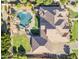 Overhead view of a property with a large pool, spa, lush landscaping, and a spacious outdoor area at 3446 E Knoll St, Mesa, AZ 85213