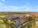 Expansive backyard oasis featuring pool, putting green, mature trees, and privacy in a desert community at 3446 E Knoll St, Mesa, AZ 85213