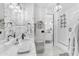 Bathroom featuring stone accents, marble counters, mosaic tile floors, and a shower at 3446 E Knoll St, Mesa, AZ 85213