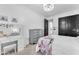 Bedroom with a chandelier, black closet doors, vanity, and dresser at 3446 E Knoll St, Mesa, AZ 85213