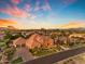 Expansive desert home with circular driveway and mature landscaping in an established neighborhood at 3446 E Knoll St, Mesa, AZ 85213