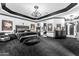 Spacious main bedroom with stylish décor, a fireplace, and access to other rooms at 3446 E Knoll St, Mesa, AZ 85213