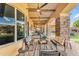 Covered patio with stone pillars and outdoor seating area at 3446 E Knoll St, Mesa, AZ 85213