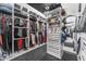 Spacious walk-in closet with custom shelving, drawers, and ample storage space at 3446 E Knoll St, Mesa, AZ 85213