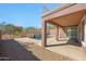 Outdoor patio with a stunning view of the pool and surrounding landscape at 34714 N 21St Ln, Phoenix, AZ 85086