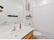 Bathroom featuring a vanity with a sink, mirror, toilet, and shower with a patterned curtain at 3654 E Henson St, San Tan Valley, AZ 85140