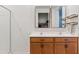 Modern bathroom showcasing double sinks, framed mirrors and unique hardware at 3654 E Henson St, San Tan Valley, AZ 85140