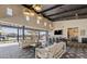 Spacious clubhouse with comfortable seating and an open layout to the pool area at 3654 E Henson St, San Tan Valley, AZ 85140