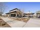 A community area with outdoor seating, barbeque, and a clubhouse, perfect for gatherings at 3654 E Henson St, San Tan Valley, AZ 85140
