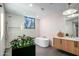 The bathroom offers a tub, standing shower, and modern fixtures at 39877 N 107Th Way, Scottsdale, AZ 85262