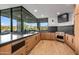 Spacious kitchen featuring stainless appliances, modern cabinetry and large windows at 39877 N 107Th Way, Scottsdale, AZ 85262