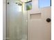 The standing glass shower features tile walls, a rain shower head, and a built-in niche at 39877 N 107Th Way, Scottsdale, AZ 85262