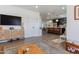 Inviting living area seamlessly flows into the kitchen, creating an open and airy atmosphere at 406 W Coolidge St, Phoenix, AZ 85013