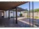 View of the patio with a large open roof and brick pavers, ideal for outdoor entertaining at 406 W Coolidge St, Phoenix, AZ 85013