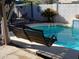 Enjoy a relaxing shaded swing next to the beautiful pool at 4150 E Harvard Ave, Gilbert, AZ 85234