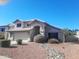 Two-story home featuring a well-manicured yard and a two-car garage at 4150 E Harvard Ave, Gilbert, AZ 85234
