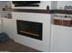 Modern fireplace surrounded by shelving on each side at 4150 E Harvard Ave, Gilbert, AZ 85234