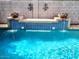 Inviting pool featuring a beautiful water feature and decorative rock-filled bowls, perfect for relaxation at 4150 E Harvard Ave, Gilbert, AZ 85234