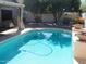 Enjoy the Arizona sunshine by this beautiful pool with lounging and dining space at 4150 E Harvard Ave, Gilbert, AZ 85234