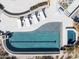 Aerial view showcasing a modern swimming pool with lounge chairs and desert landscaping at 42690 N 98Th Pl, Scottsdale, AZ 85262