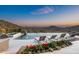 Stunning pool area with comfortable lounge chairs, desert views, and an outdoor spa at 42690 N 98Th Pl, Scottsdale, AZ 85262