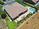 Expansive backyard oasis featuring a sparkling pool, spa, putting green, and multiple seating areas at 6044 E Hodges St, Cave Creek, AZ 85331