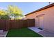 Cozy patio area with artificial turf and desert landscaping at 6044 E Hodges St, Cave Creek, AZ 85331