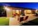 Backyard patio with a fire pit and comfortable seating, perfect for evening gatherings at 6044 E Hodges St, Cave Creek, AZ 85331