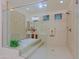 A luxurious bathroom with a glass-enclosed shower and a soaking tub at 6044 E Hodges St, Cave Creek, AZ 85331