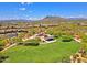 Community park featuring a playground, picnic area, and green space with mountain views in the background at 6044 E Hodges St, Cave Creek, AZ 85331