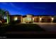 Charming home featuring a stone facade, tile roof, and an attached two-car garage at 6044 E Hodges St, Cave Creek, AZ 85331
