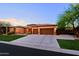 Charming single-story home with a well-manicured lawn and a spacious three-car garage at 6044 E Hodges St, Cave Creek, AZ 85331