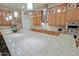 Bright kitchen featuring a large island with granite countertop, stainless steel appliances, and ample storage at 6044 E Hodges St, Cave Creek, AZ 85331