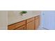 Kitchenette with light quartz countertops, wooden cabinets, and stainless-steel hardware at 6044 E Hodges St, Cave Creek, AZ 85331