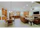 Spacious open-concept living area with wood floors and an expansive kitchen at 6044 E Hodges St, Cave Creek, AZ 85331