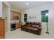 Relaxing living room with cozy seating, wet bar, and ample natural light at 6044 E Hodges St, Cave Creek, AZ 85331