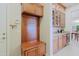 Inviting mudroom features a convenient bench, coat hooks, and built-in storage cabinets at 6044 E Hodges St, Cave Creek, AZ 85331