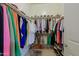Spacious walk-in closet features well-arranged clothing and shoe storage at 6044 E Hodges St, Cave Creek, AZ 85331