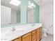 Inviting bathroom features dual sinks, a vanity, and tile floors at 617 N Cobblestone St, Gilbert, AZ 85234