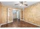 Bedroom has an abundance of natural light and wood-look flooring at 617 N Cobblestone St, Gilbert, AZ 85234