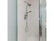 This modern shower features a dual showerhead at 617 N Cobblestone St, Gilbert, AZ 85234