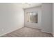 Neutral bedroom with blinds and carpeted floor at 625 N Hamilton St # 36, Chandler, AZ 85225